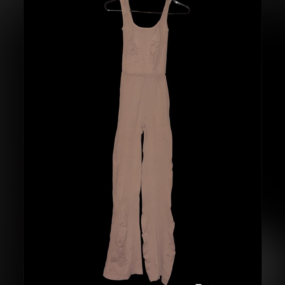 NWOT Free People Movement Good Karma flare onesie in mocha
